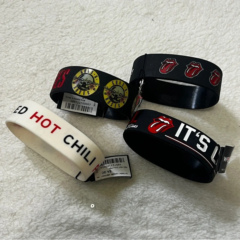 Bundle of 4 Rubber Rock Band Bracelets NWT